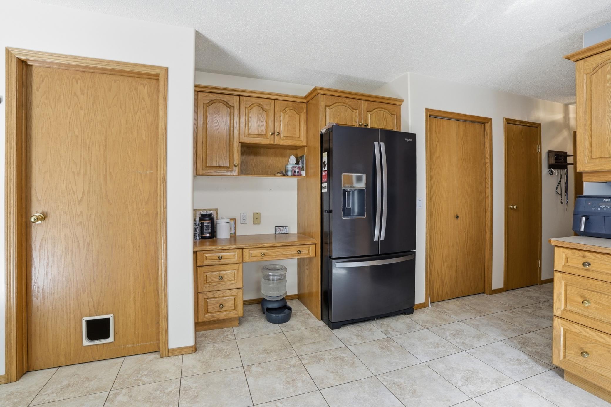 Kitchen with built in desk