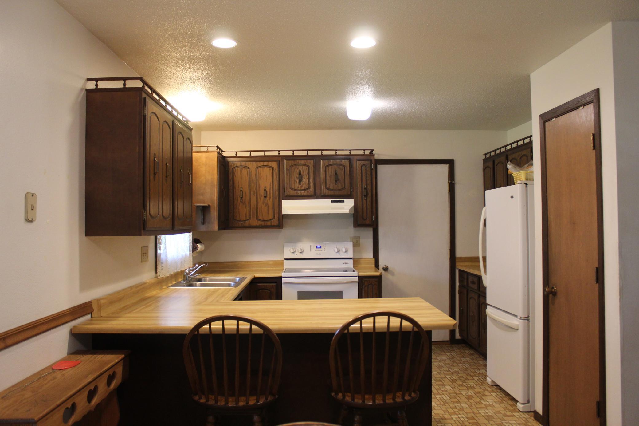 Eat in Kitchen with abundant cabinetry and storage. All appliances included!