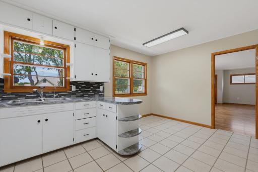 The eat-in kitchen features a window above the sink.