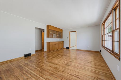 A built-in cabinet is featured in the living room.