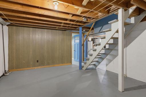 Head downstairs to the unfinished basement.