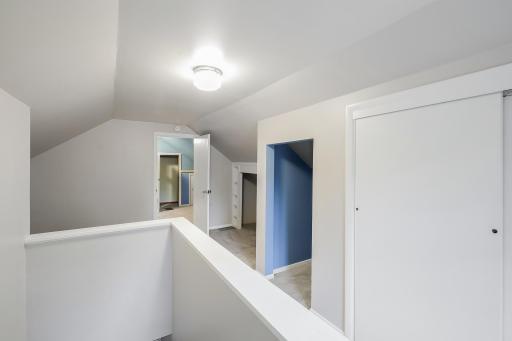 The upper level expansion features a hall closet, playroom nook(blue doorway, bonus area and a large 3rd bedroom.