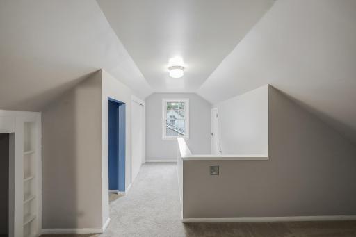 Reverse hall view. The white door on the rear right is the cedar closet.