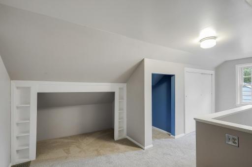 Small bookcase and added storage space for toy bins or whatever you wish.