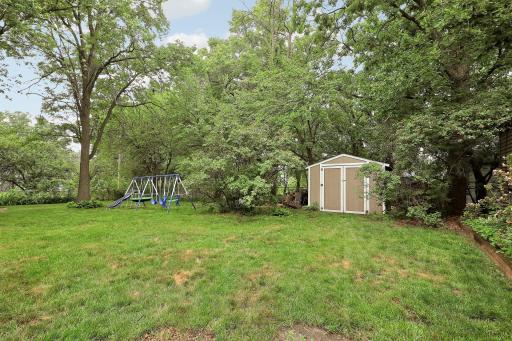 Large fenced backyard and 10' x 10 storage shed.'