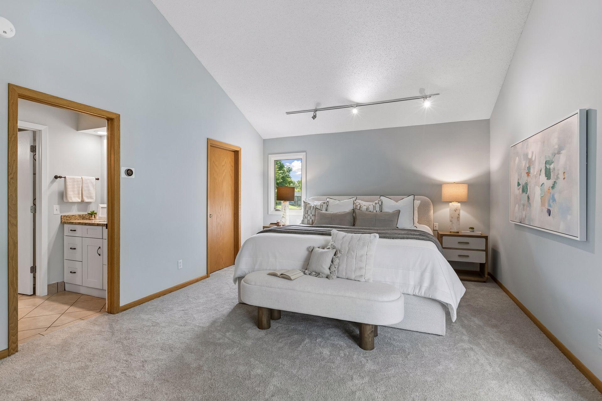 Spacious primary suite designed as a relaxing retreat.