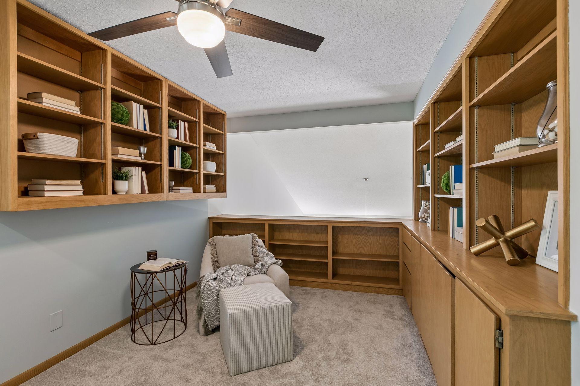 Versatile bonus space within the primary suite, ideal for a reading nook or home office.