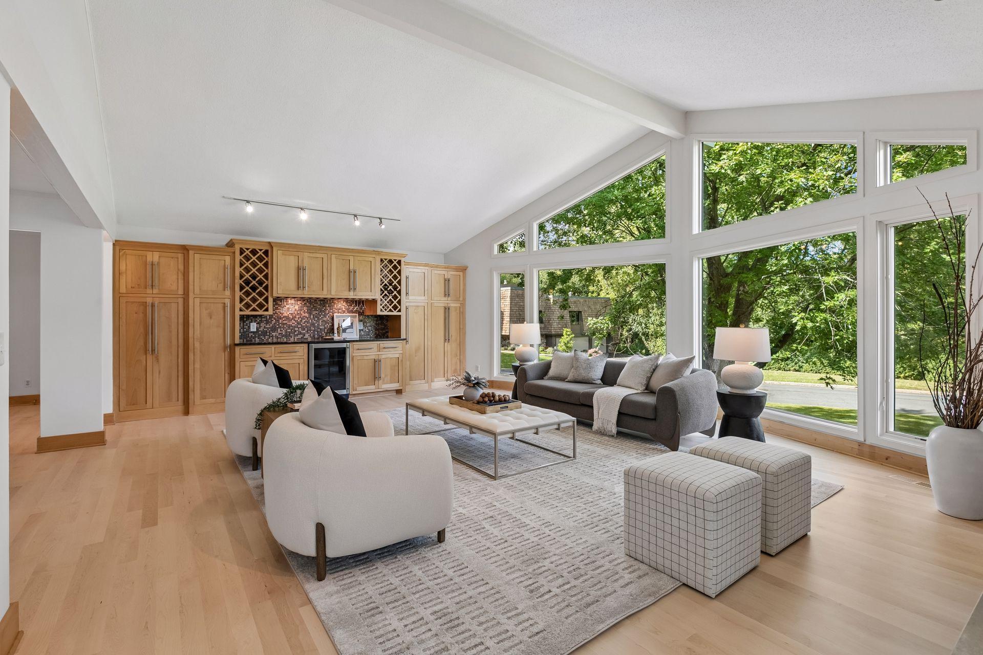 Vaulted ceilings and new maple hardwood floors create a bright, open feel.