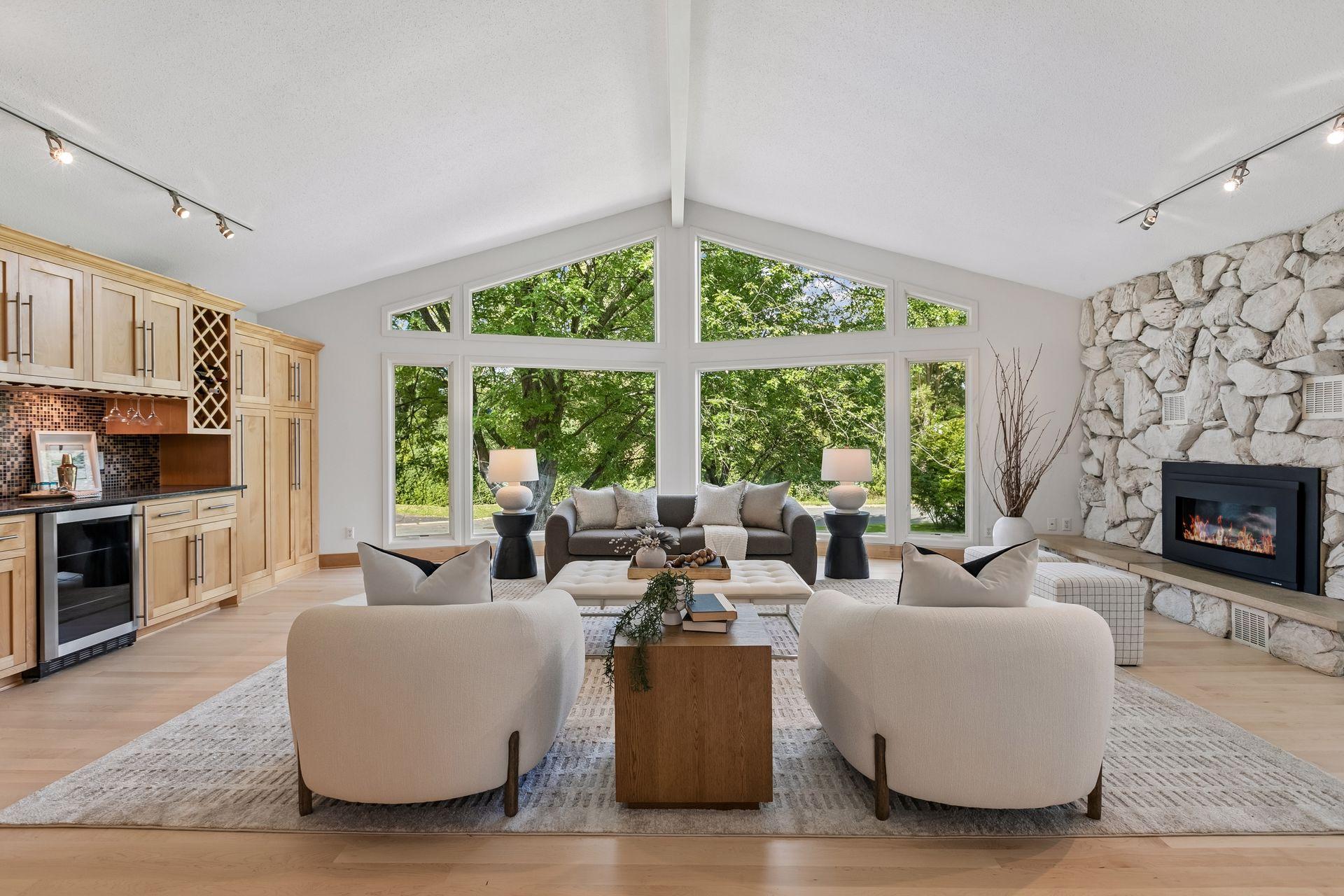 Natural light and a welcoming gas fireplace create a warm retreat.