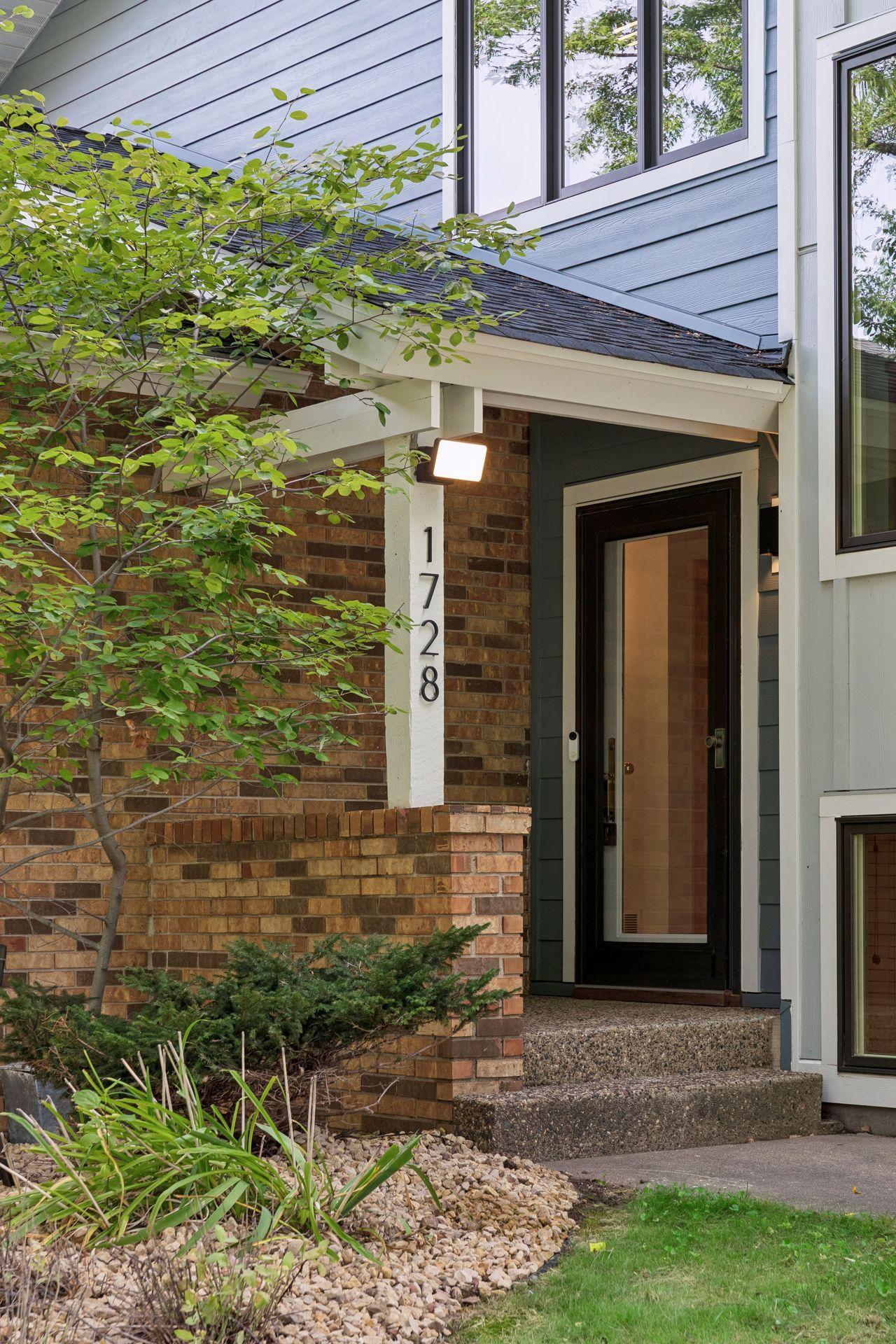 Charming front entry creates a warm first impression.
