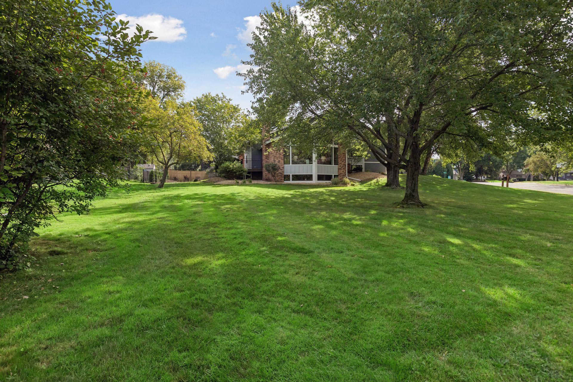Oversized corner lot offers abundant yard space.