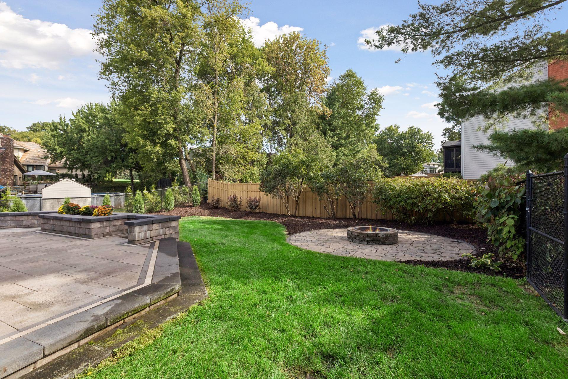 Fully fenced in backyard space.