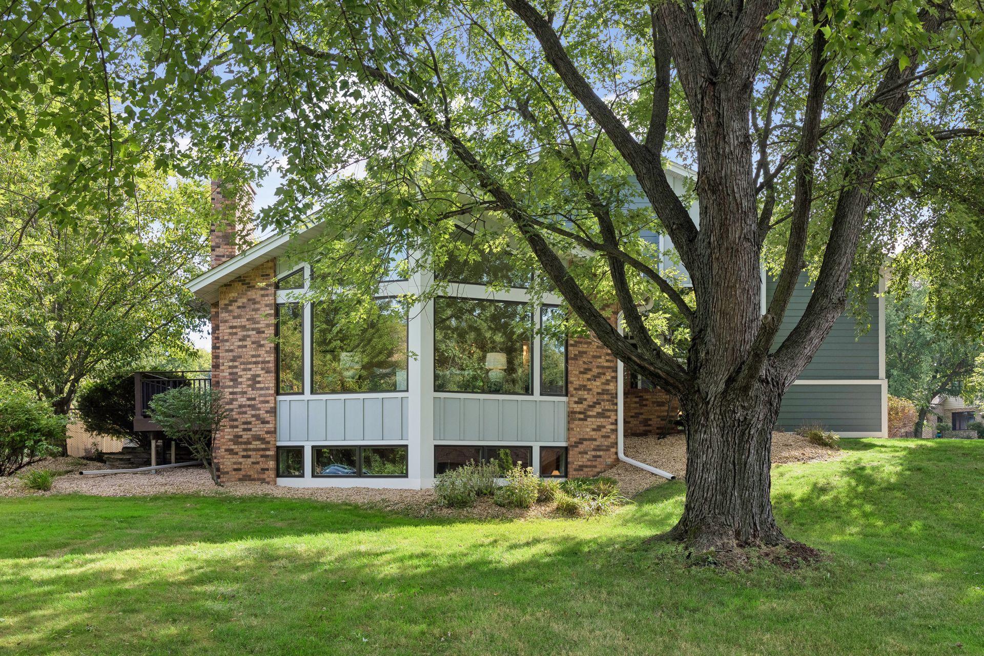 Large windows showcase beautiful natural light throughout.