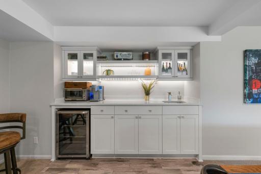 Ideal for hosting and entertaining, the wet bar offers a stylish and functional space for gathering with guests.