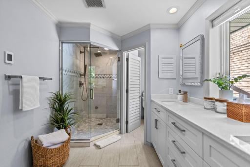 The primary bedroom features a luxurious private three-quarter ensuite bathroom.