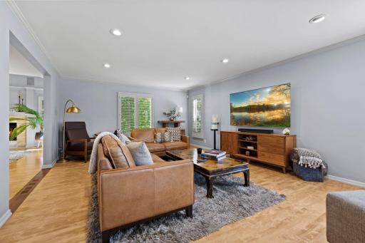 Spacious main-level family room conveniently located just off the foyer and formal dining room, creating an ideal setting for everyday living and entertaining.