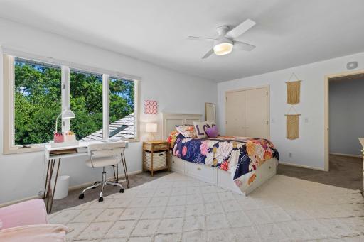 An alternate view of bedroom two, showcasing its spacious layout and comfortable design.