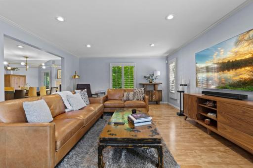 An alternate view of the main-level living room, showcasing its spacious and inviting layout.