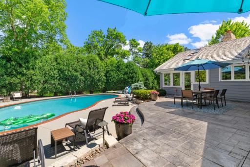 Enjoy summer days in the fully fenced backyard, complete with a consistently well-maintained pool and pool deck featuring a new surface (2026), along with a newer high-efficiency pool filter pump and pool heater.