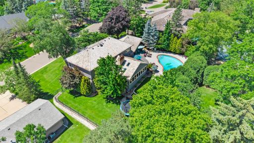 Nestled on a private and beautifully landscaped .35-acre lot, this exceptional property offers 4,400 finished square feet of thoughtfully designed living space, featuring four bedrooms, five bathrooms, and a heated three-car garage.