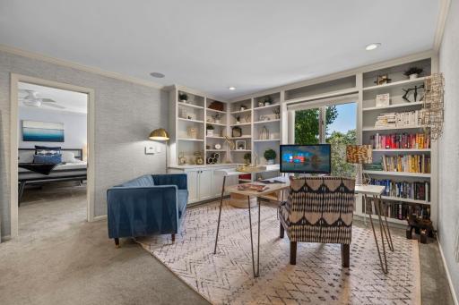 Enjoy the versatility of the primary suite's attached office, offering the perfect space for work, reading, relaxation, or hobbies.