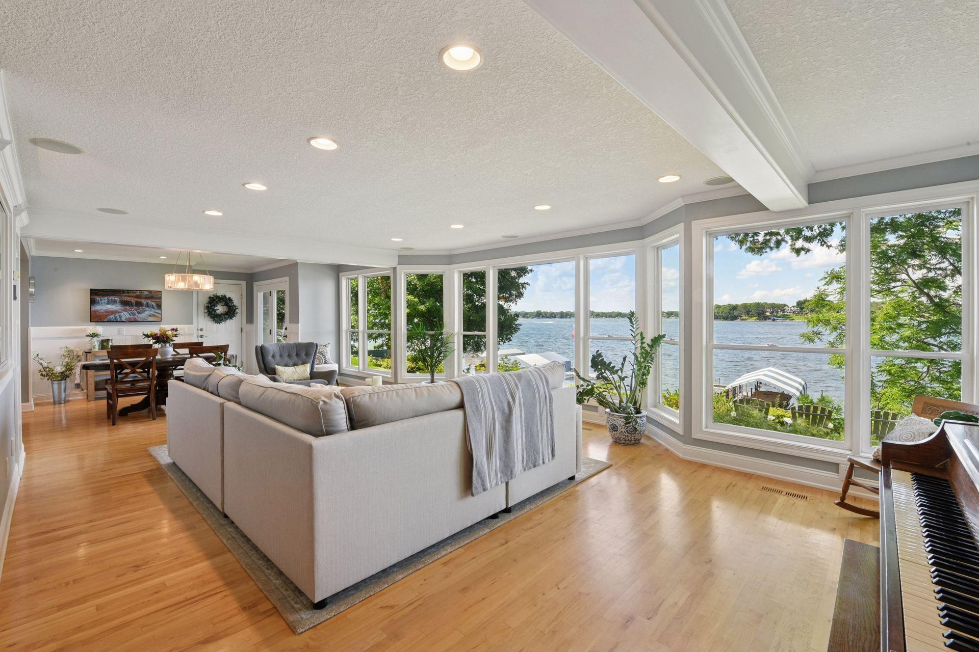 Bright, open spaces are filled with natural light and panoramic lake views.