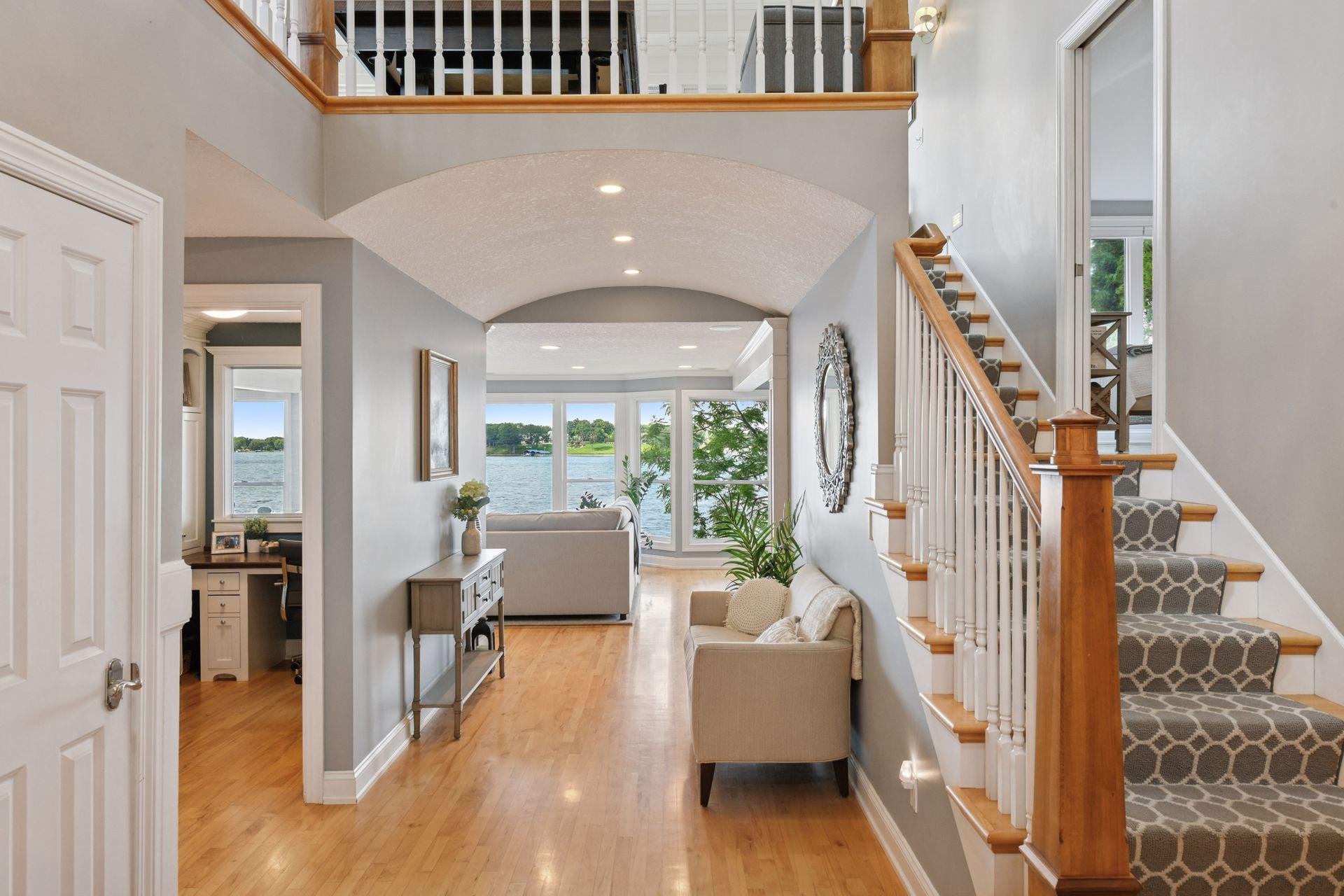 Welcoming lake views from the front entry and almost every room in the house!