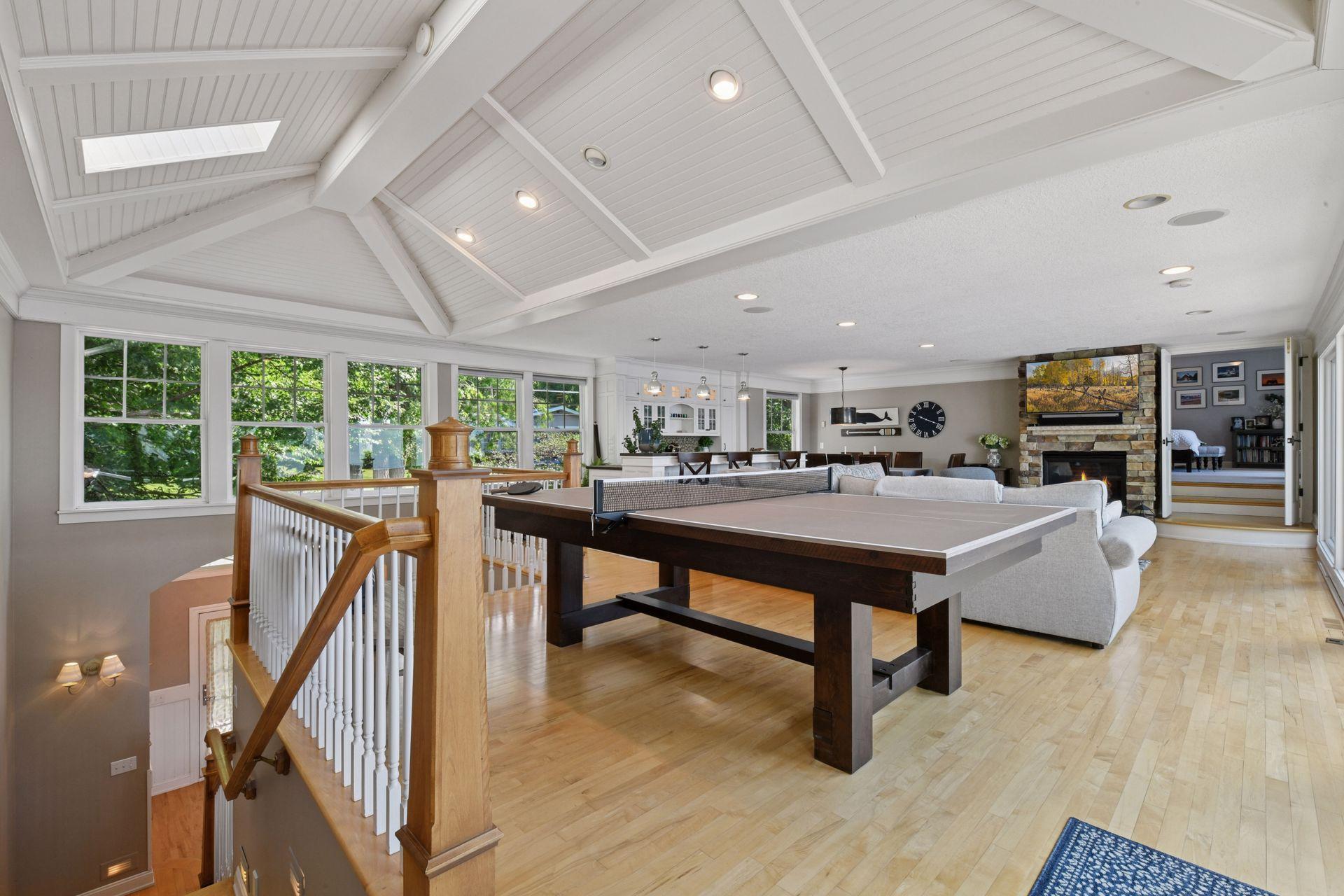 Enjoy a game of ping pong or billiards in this fabulous entertaining area