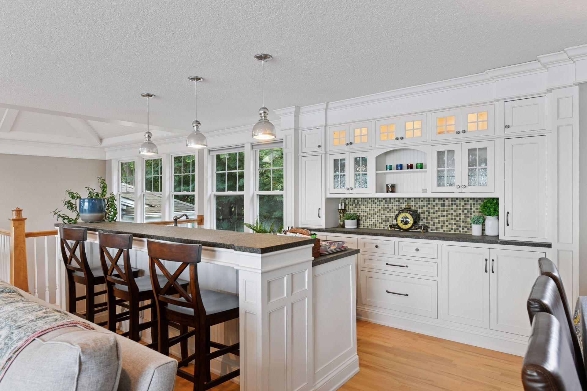 Wet bar area with 2 undercounter refrigerators and dishwashers