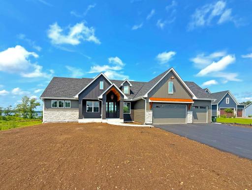 Surrounded by quality-built homes in a growing neighborhood, this exceptional property offers the ideal setting to enjoy everything lake life has to offer.