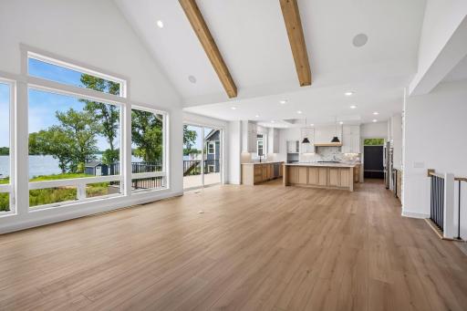 Seamlessly connected to the chef's kitchen and outdoor living spaces, this open-concept design offers an exceptional setting for gathering with family and friends.
