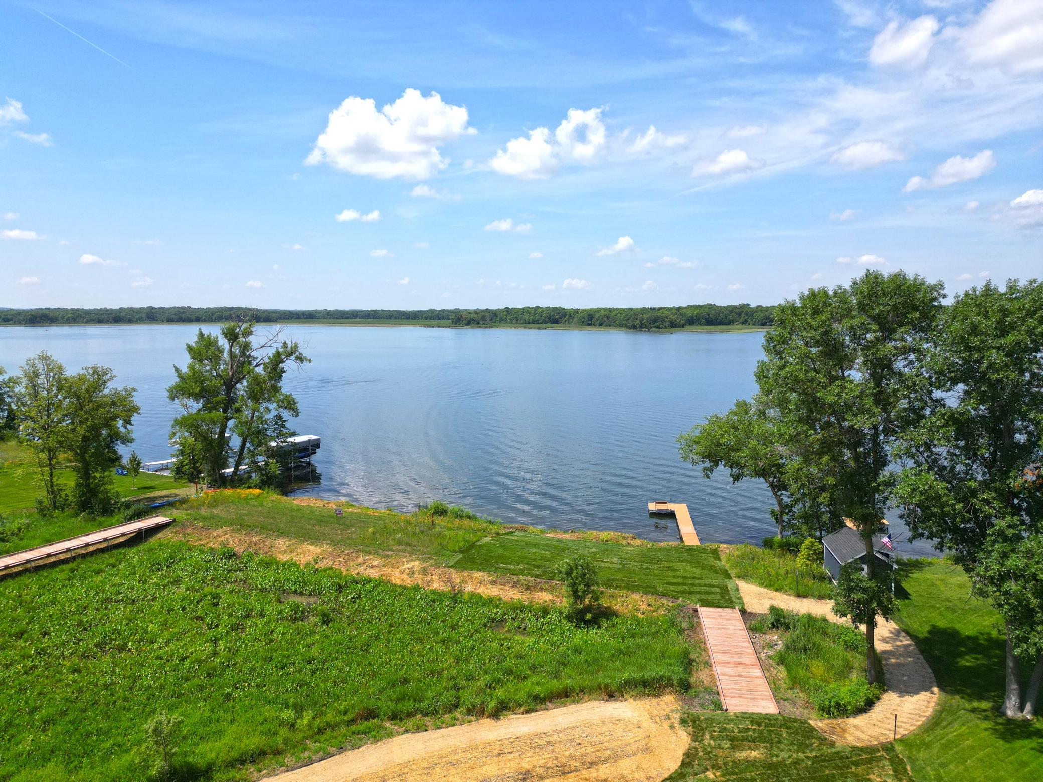 You will fall in love with a picturesque boardwalk leading to over 85 feet of sandy, hard-bottom shoreline, where breathtaking sunsets await each evening.