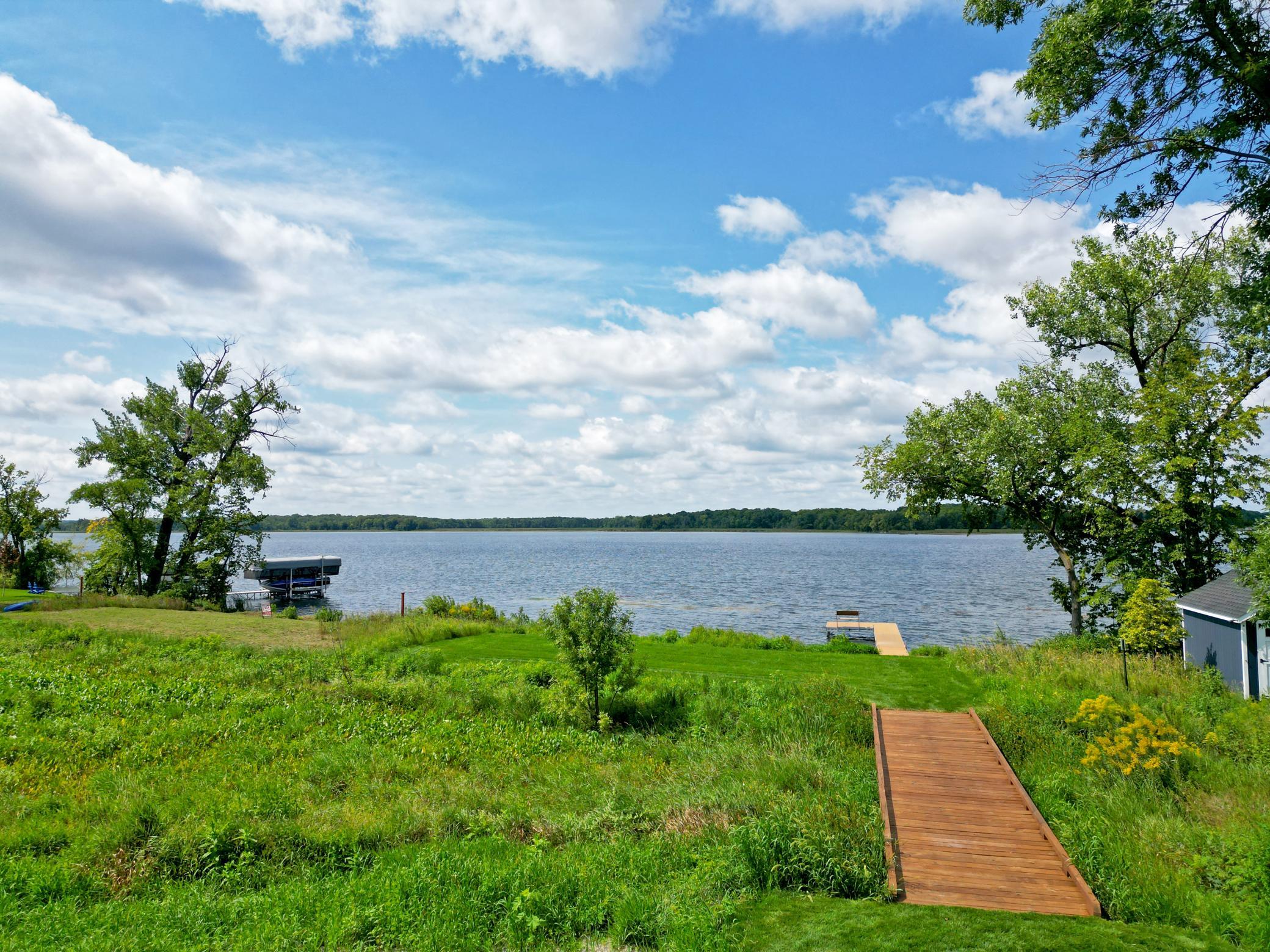 You will fall in love with a picturesque boardwalk leading to over 85 feet of sandy, hard-bottom shoreline, where breathtaking sunsets await each evening.