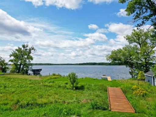 You will fall in love with a picturesque boardwalk leading to over 85 feet of sandy, hard-bottom shoreline, where breathtaking sunsets await each evening.