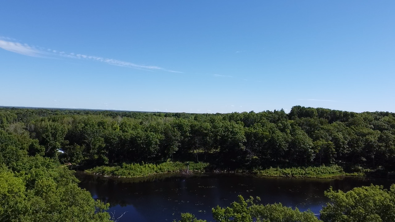 Property borders on this pond.