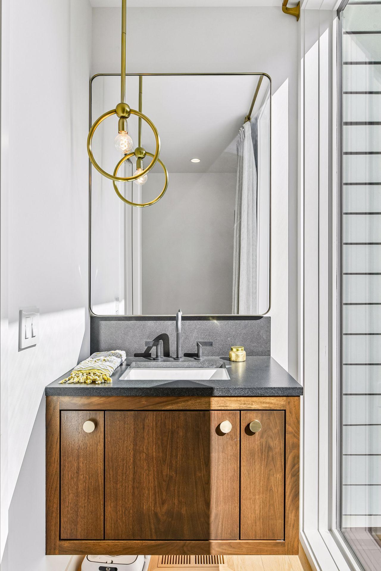 Main level 1/2 bath with designer lighting