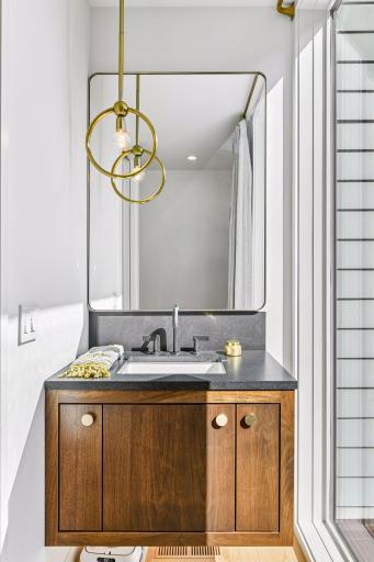 Main level 1/2 bath with designer lighting