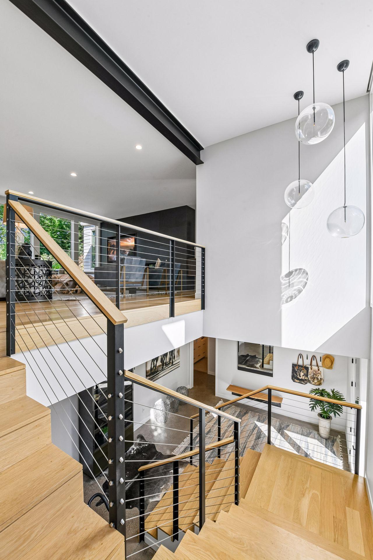 Open staircase brings you upstairs to the main level