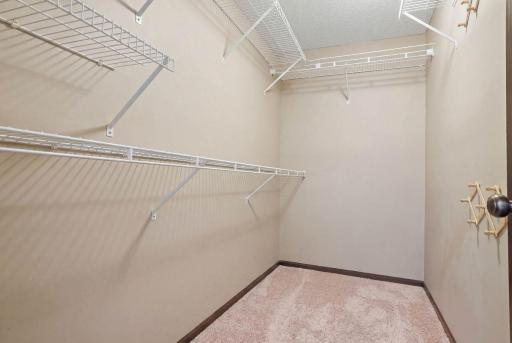 Plenty of closet/storage space in the primary bedroom walk-in closet.