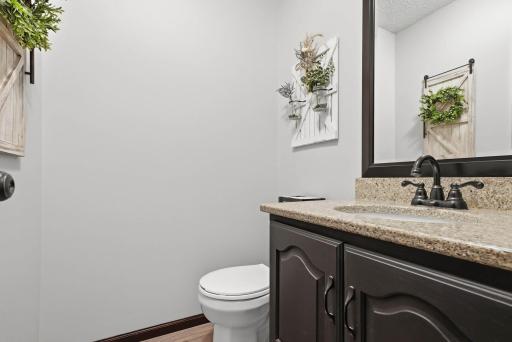 Main level half bathroom.