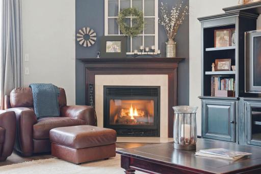 Living room features gas fireplace.