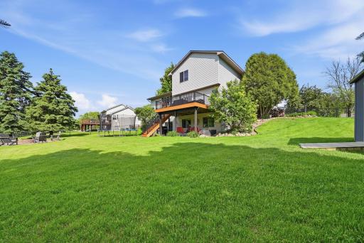 Well-maintained backyard features beautiful landscaping and well-manicured lawn. Property include in-ground irrigation.