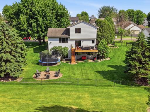 Beautiful, spacious, and well-maintained outdoor space. Overlook the fenced-in backyard from the NEWER 14x18 deck. Plenty of room for kids and pets to wear off some energy!