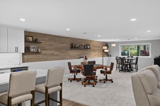 Open lower level living area filled with natural light.