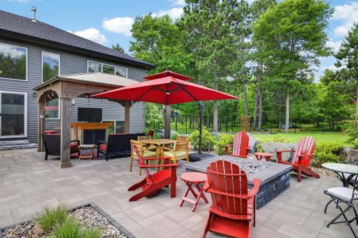 Patio dining space overlooking the backyard.