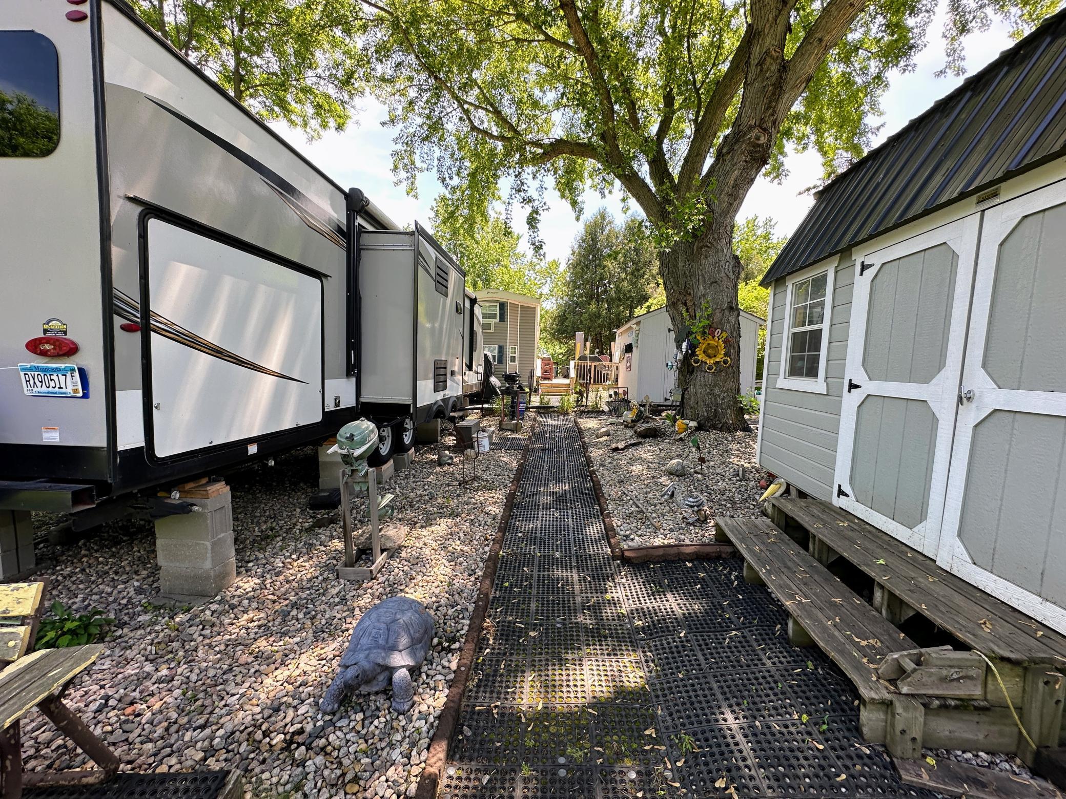 Travel Trailer/Park Model/ 2-Storage Sheds