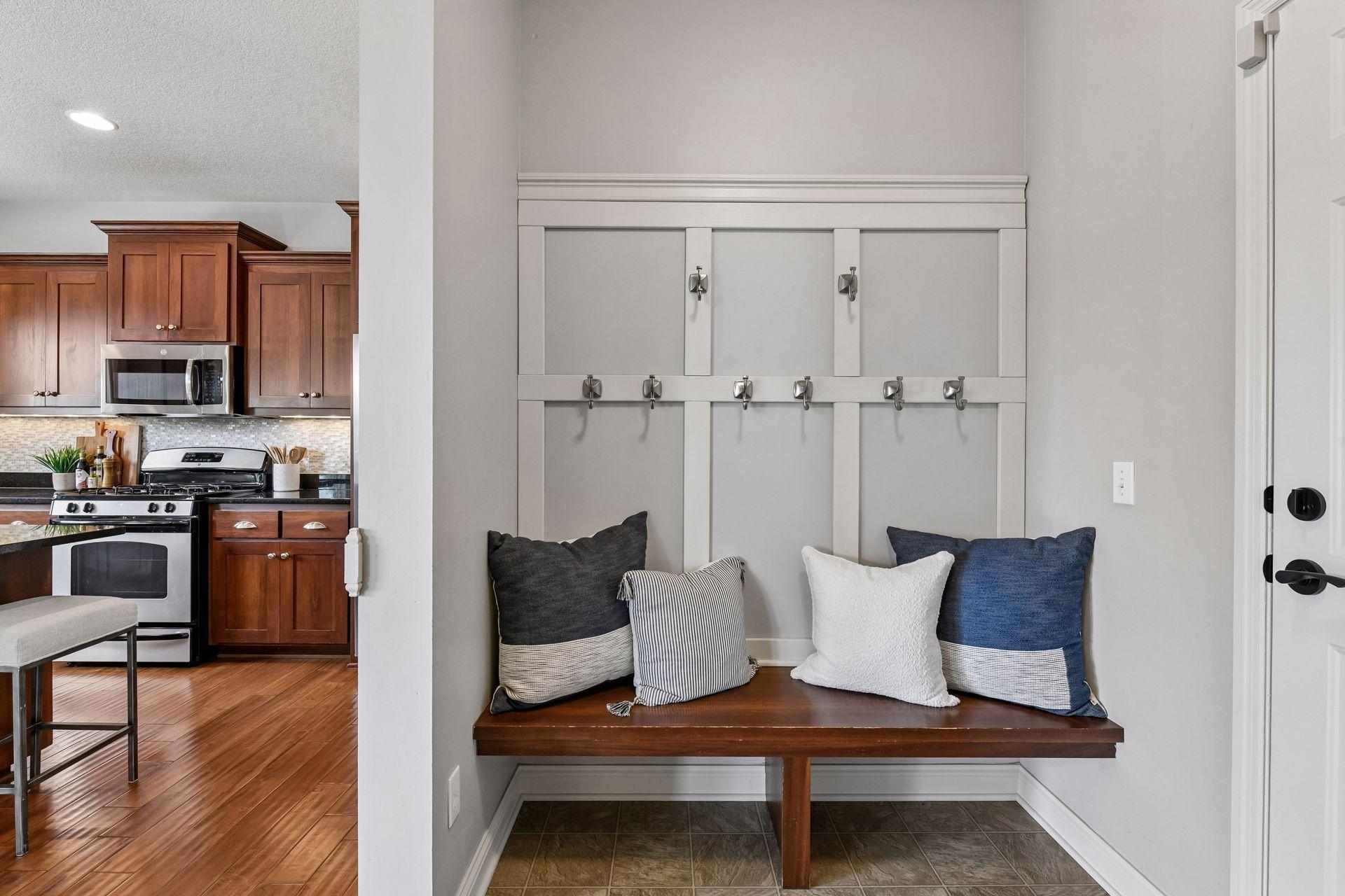 A spacious mudroom off the garage adds convenience and functionality.