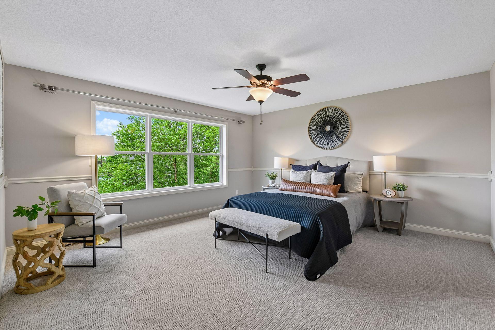 Upstairs, the luxurious primary suite serves as a private retreat, complete with a full bathroom featuring dual vanities, soaking tub, walk-in shower, and spacious walk-in closet.
