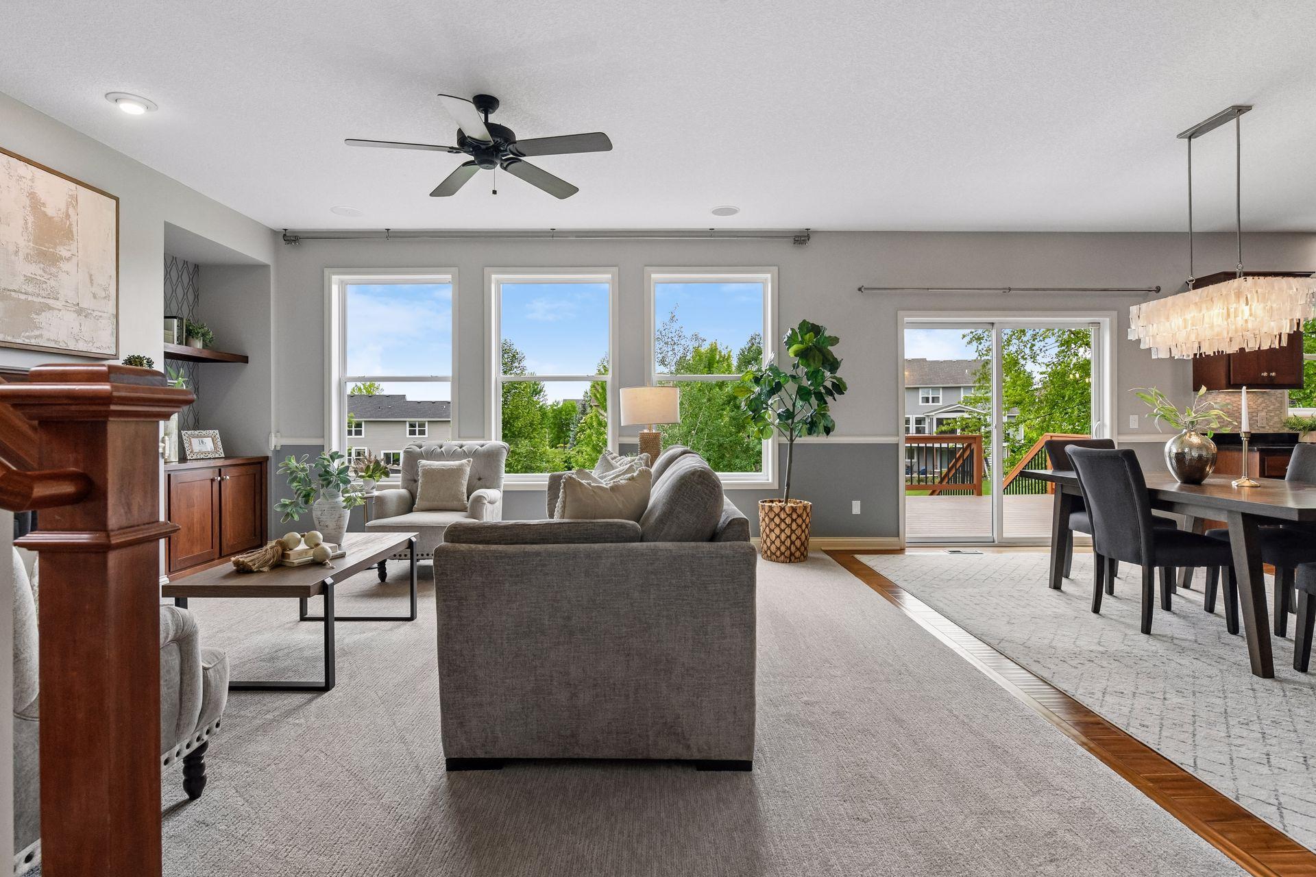 The open-concept main level is ideal for both everyday living and entertaining, seamlessly connecting the kitchen, dining, and living areas.