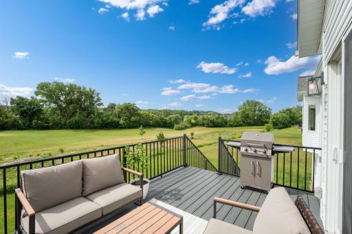 Featuring lush green southern views from the deck or LL patio.